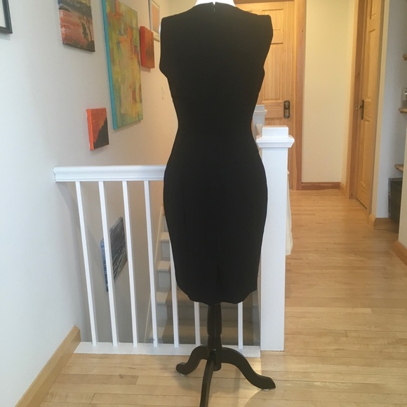 Lovely Calvin Klein black fitted dress, with gold accent pockets. - Picture 2 of 16